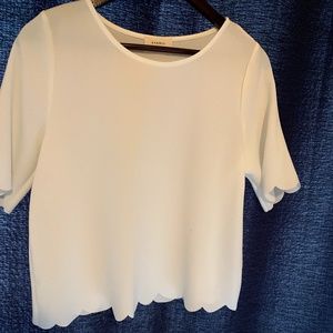 White scalloped hem shirt